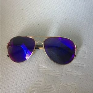 Purple Oakley sunglasses